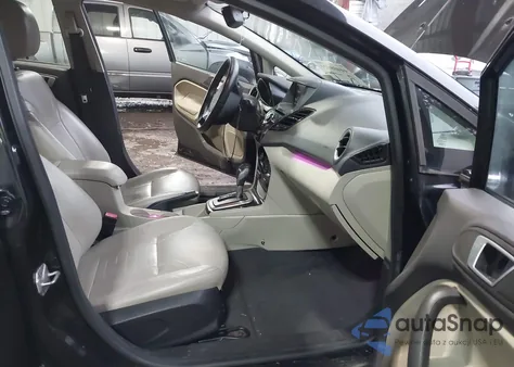 2014 Ford Fiesta Titanium из США, поврежденный, VIN 3FADP4FJ9EM122869